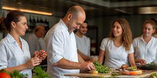Group of participants enjoying a cooking class